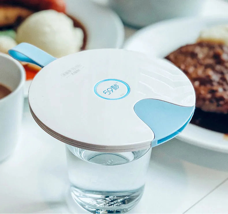 Portable baby bottle steriliser showing compact blue design with USB port and measuring 163.6mm long