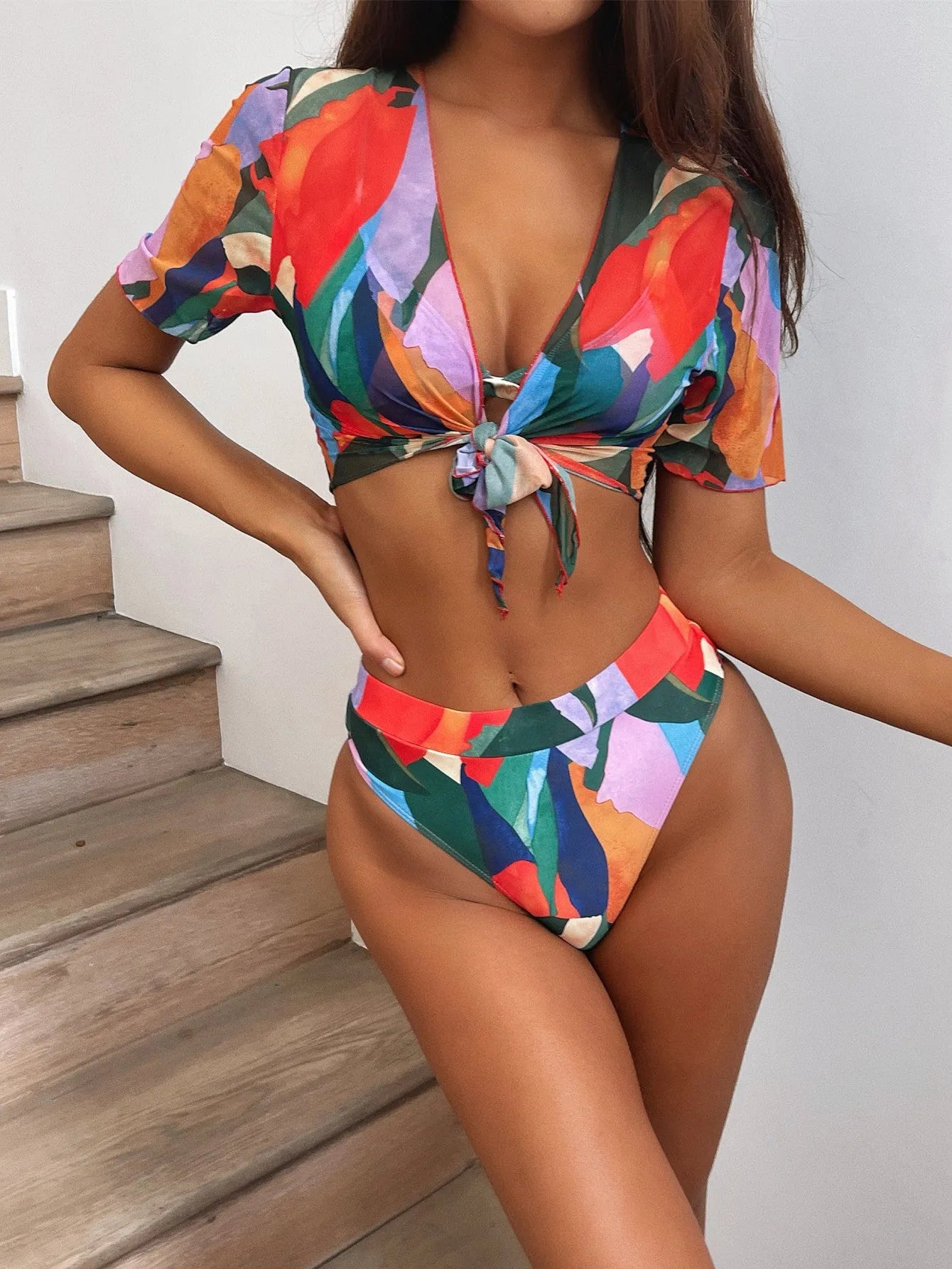 Red women's printed split swimsuit made of nylon for swimming and wading sports.