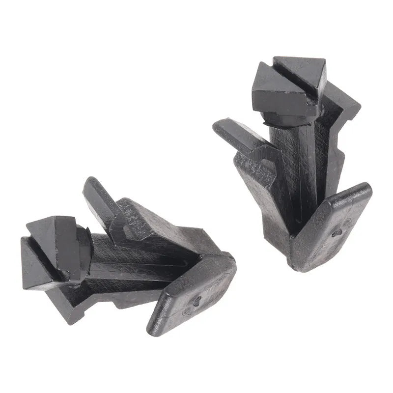 Black automotive fastener clip for Nissan bumper and grille, part number 76882-0M060.