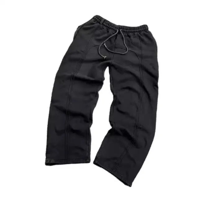 Men's loose fit cropped sweatpants with rope drawstring waist, available in black, gray, and green