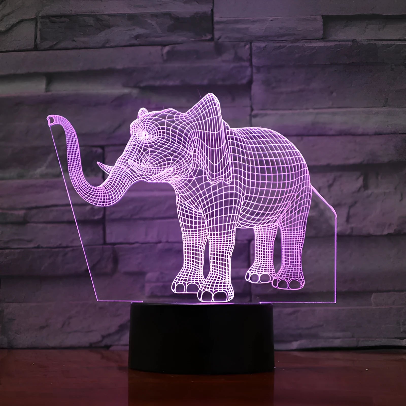 3D elephant-shaped acrylic desk lamp with seven colour modes, USB-powered, on a desk surface