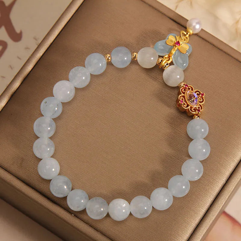 Women's crystal bracelet with butterfly pendant and aquamarine rhinestones