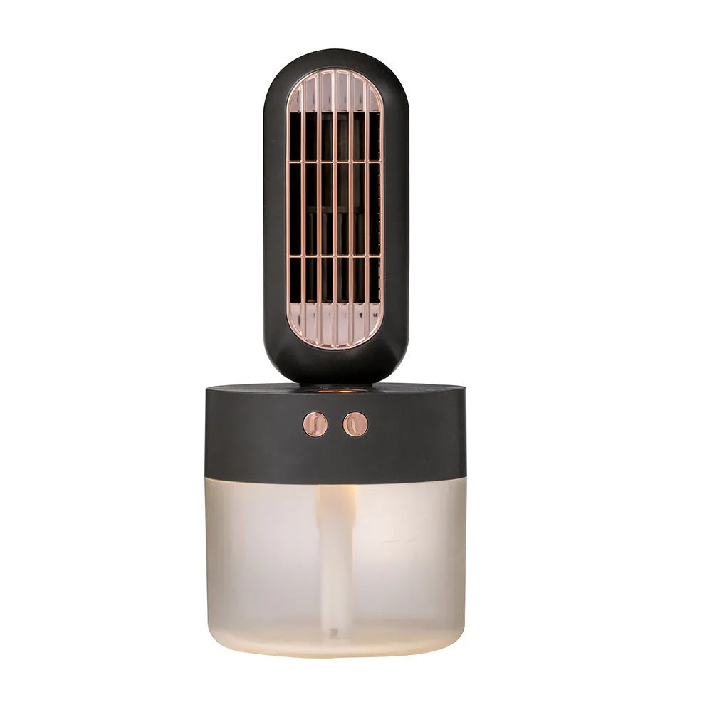 Small black and white personal humidifier fan with oscillating head on a desk