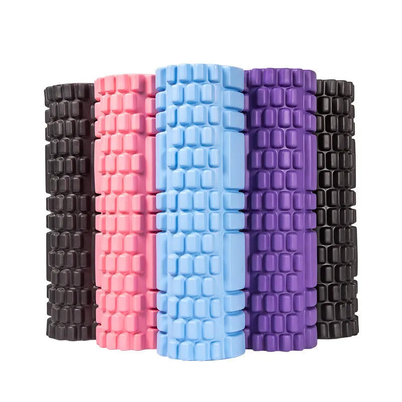 A firm EVA foam roller for fitness and yoga, shown in a selection of colours including black, pink, and sky blue.