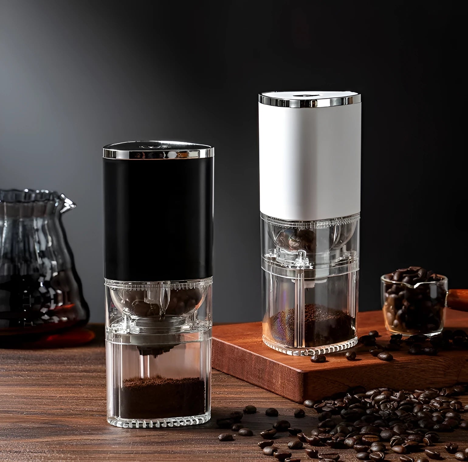 White and black portable electric coffee grinder with ceramic burr and USB charging cable.