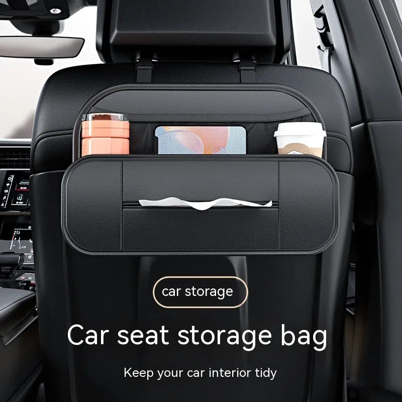 Black leather car seat storage bag with customisable compartments mounted on vehicle seatback