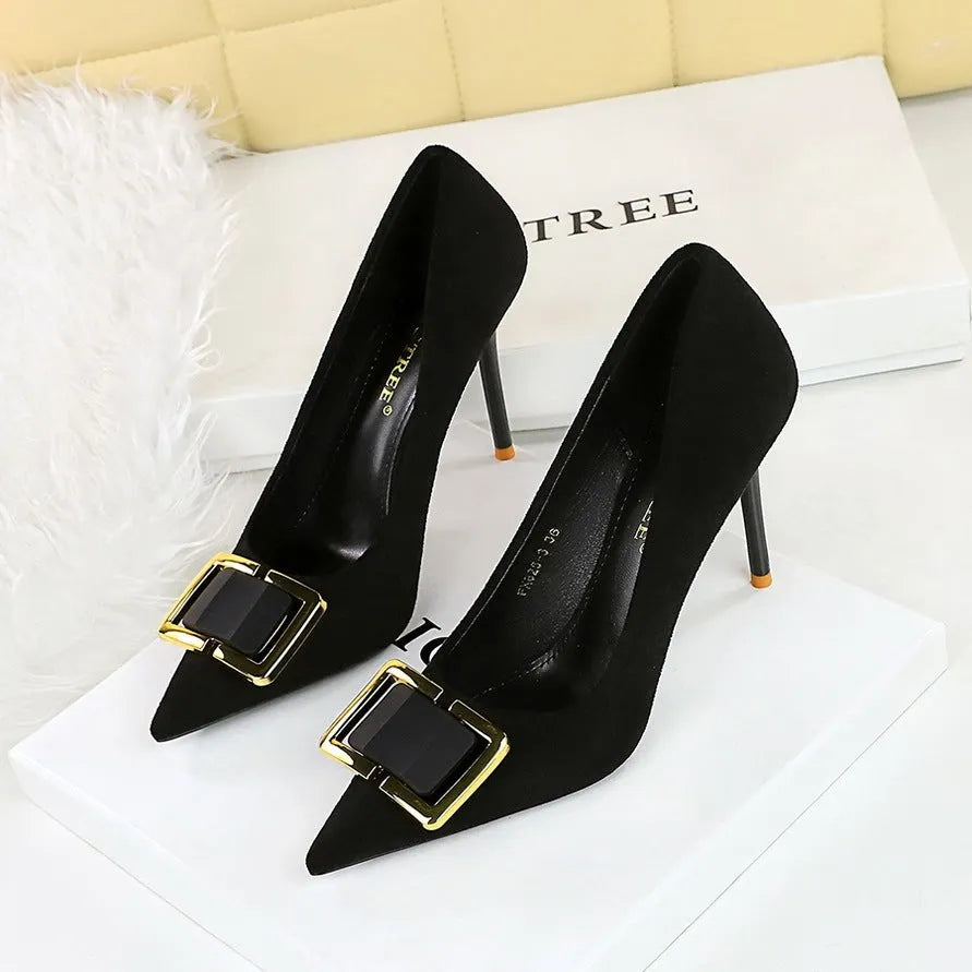 Black suede women's stiletto high heels with a 9cm heel and pointed toe on a plain background.
