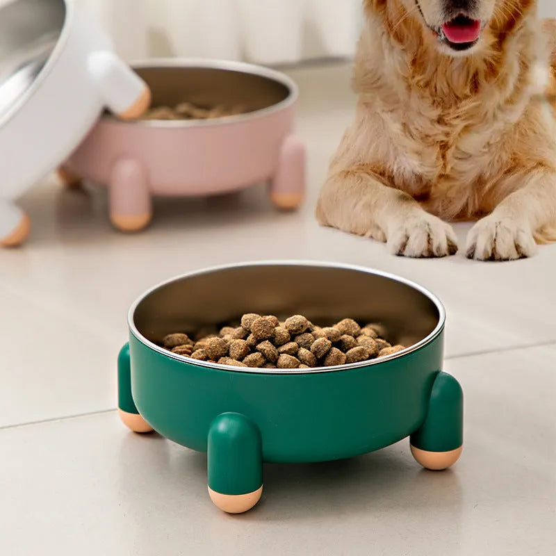 Stainless steel non-slip pet bowl with raised feet in green, pink, and white colour options.