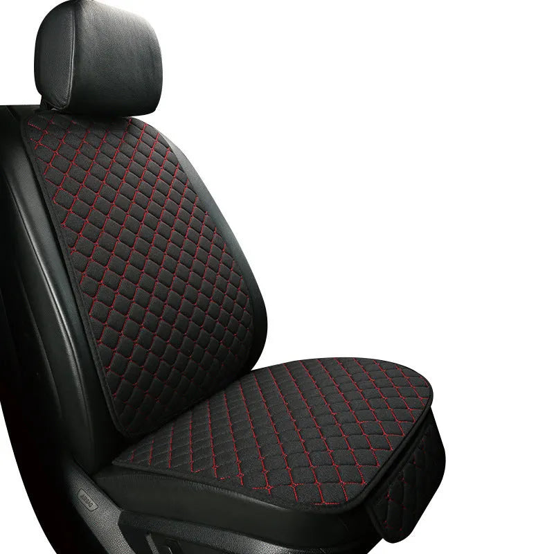 Linen car seat cushion with memory foam in Warm Cream colour on a car seat.