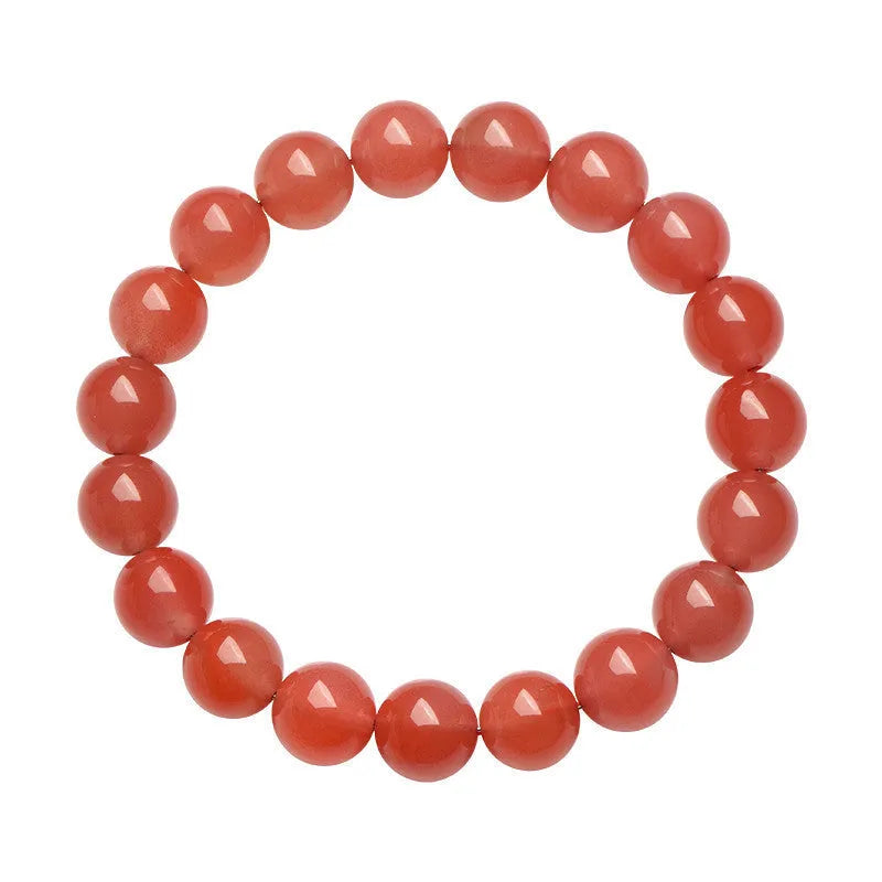Natural cherry red agate beaded bracelet showing polished stones on a wrist, demonstrating single and triple strand options.