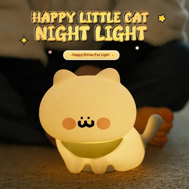 Cartoon silicone happy kitten night light with yellow light and built-in battery for bedside use