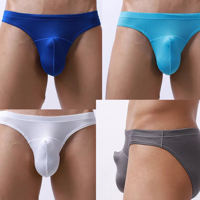 Men's loose-fitting light blue nylon boxer shorts laid flat on a surface