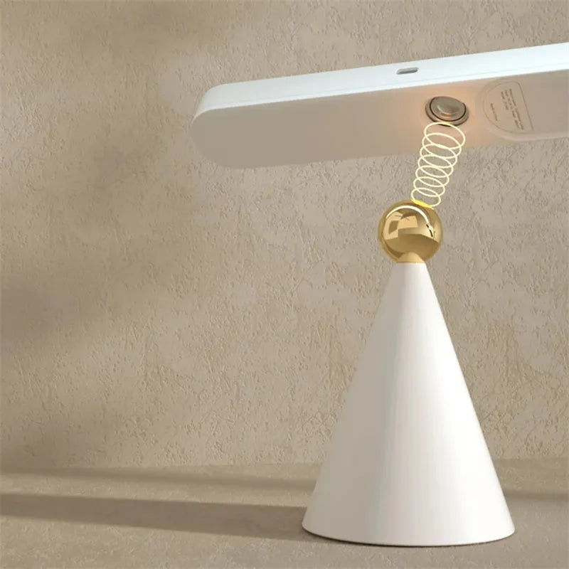 Geometric white desk lamp with magnetic base and touch controls for reading and ambient lighting