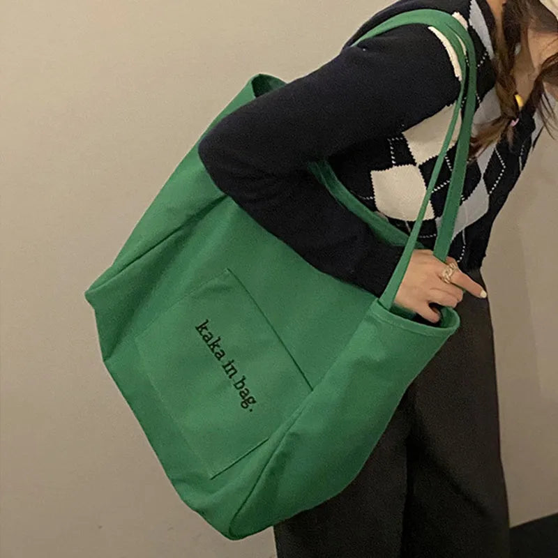 Large capacity canvas shopping tote bag in solid colour, suitable for shoulder carry