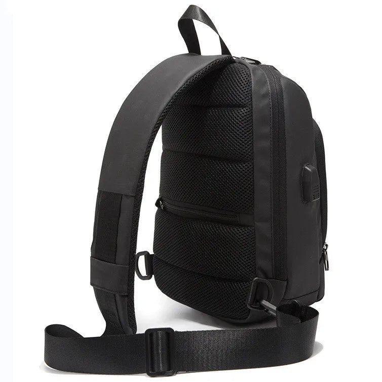 Black anti-theft chest bag with lockable zipper and USB charging port, made from Polyamide fibre, worn as a crossbody bag