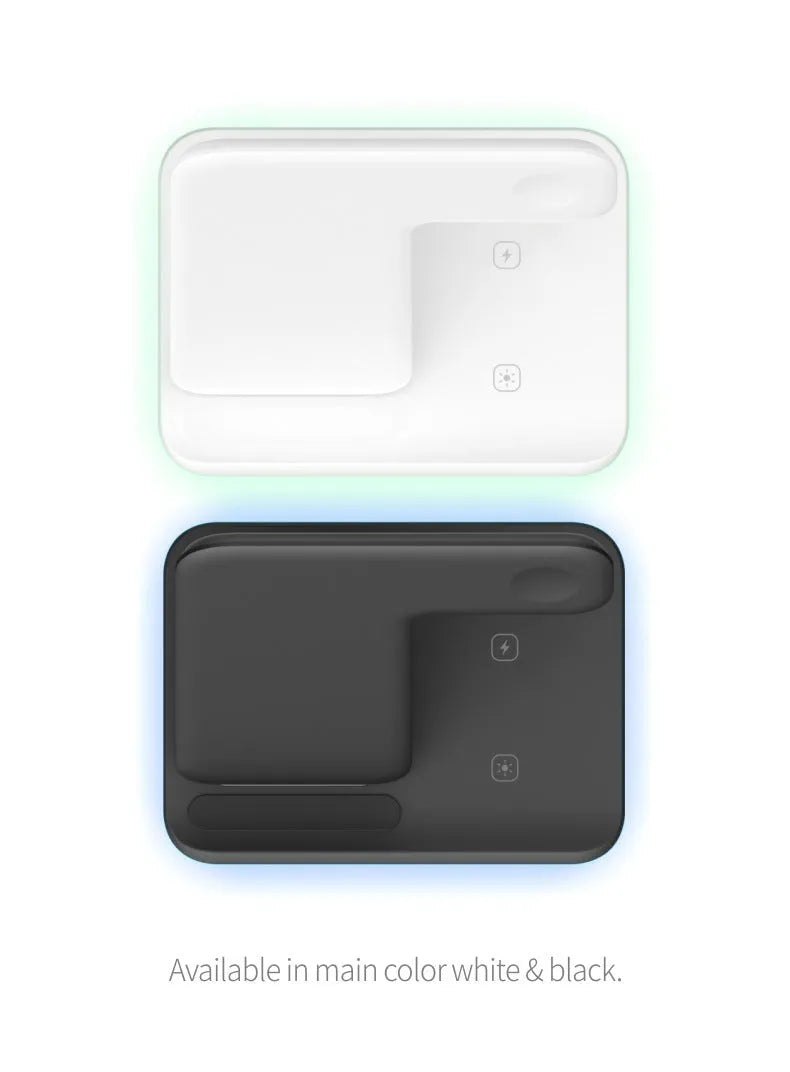 White three-in-one wireless charging station for phone, watch and headset on desktop