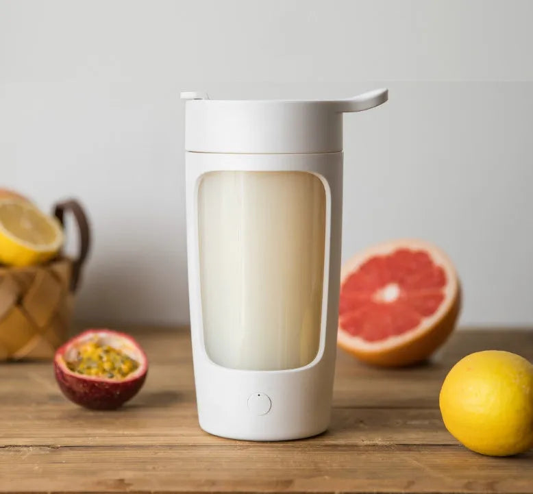 Portable juice blender with 650ml mixing cup in black, blue, pink, or white colours