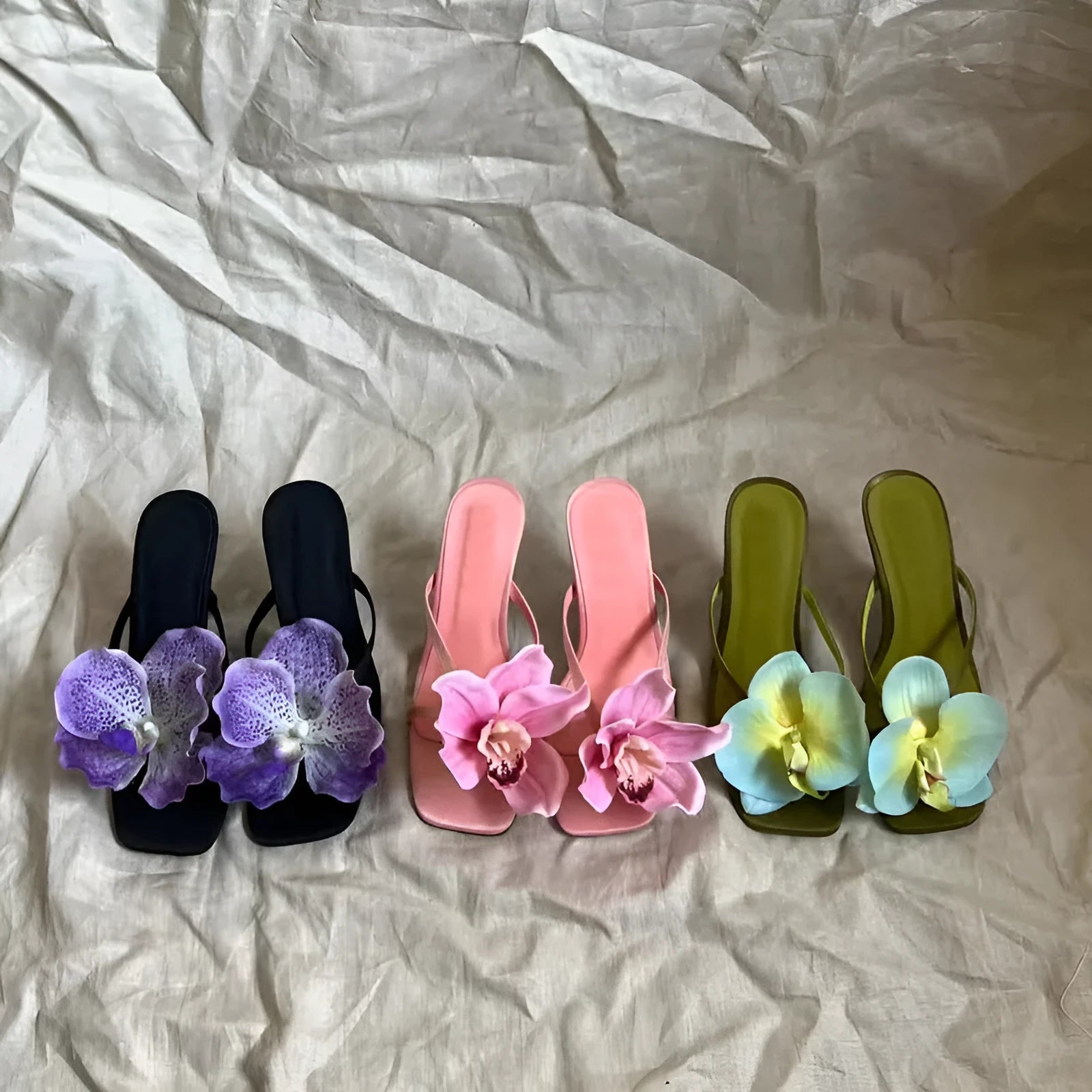 Pink women's sandals with satin uppers, artificial Phalaenopsis orchid decoration, and 3-6cm mid heel