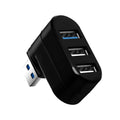 Black USB rotary splitter hub with four ports on a rotating white ABS body, shown on a desk.