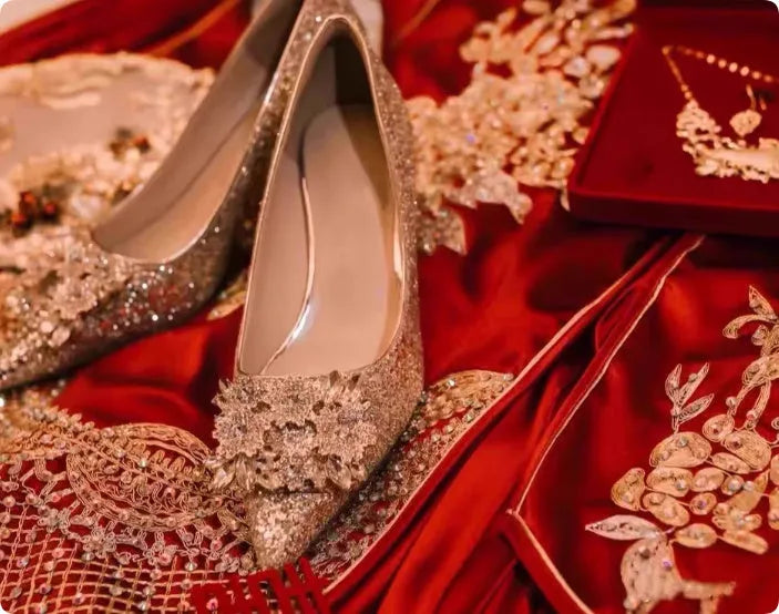 Champagne coloured pointed toe bridal shoes with rhinestone decoration and fine heel