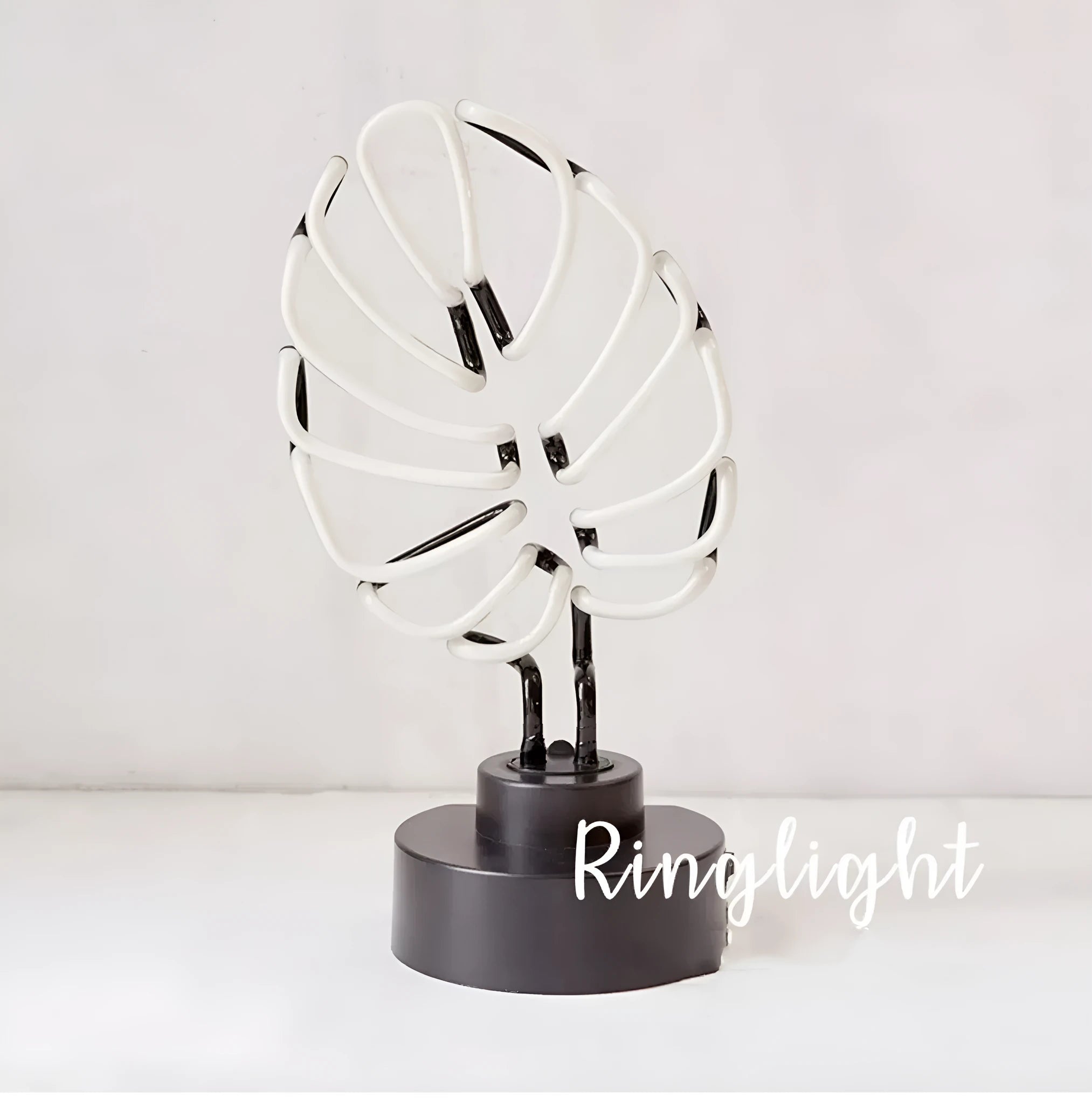 White bamboo-shaped desk lamp with green light, showing USB cable and two size options.