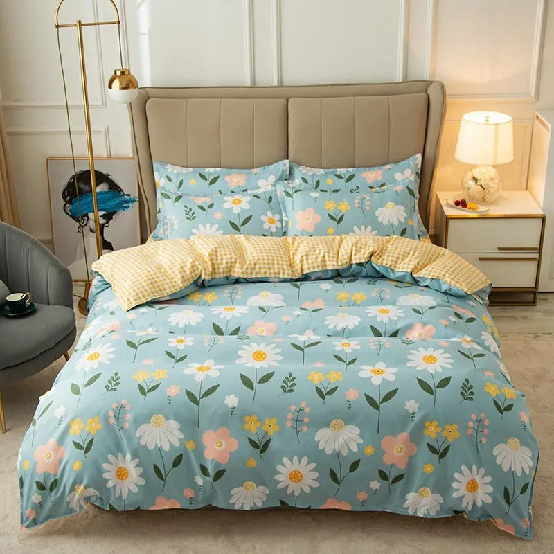 Cotton duvet cover and fitted sheet bedding set in a colour option, shown on a bed