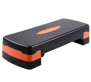 Fit step aerobics platform in grey, green, or orange, measuring 68 cm long by 28 cm wide and 15 cm high.