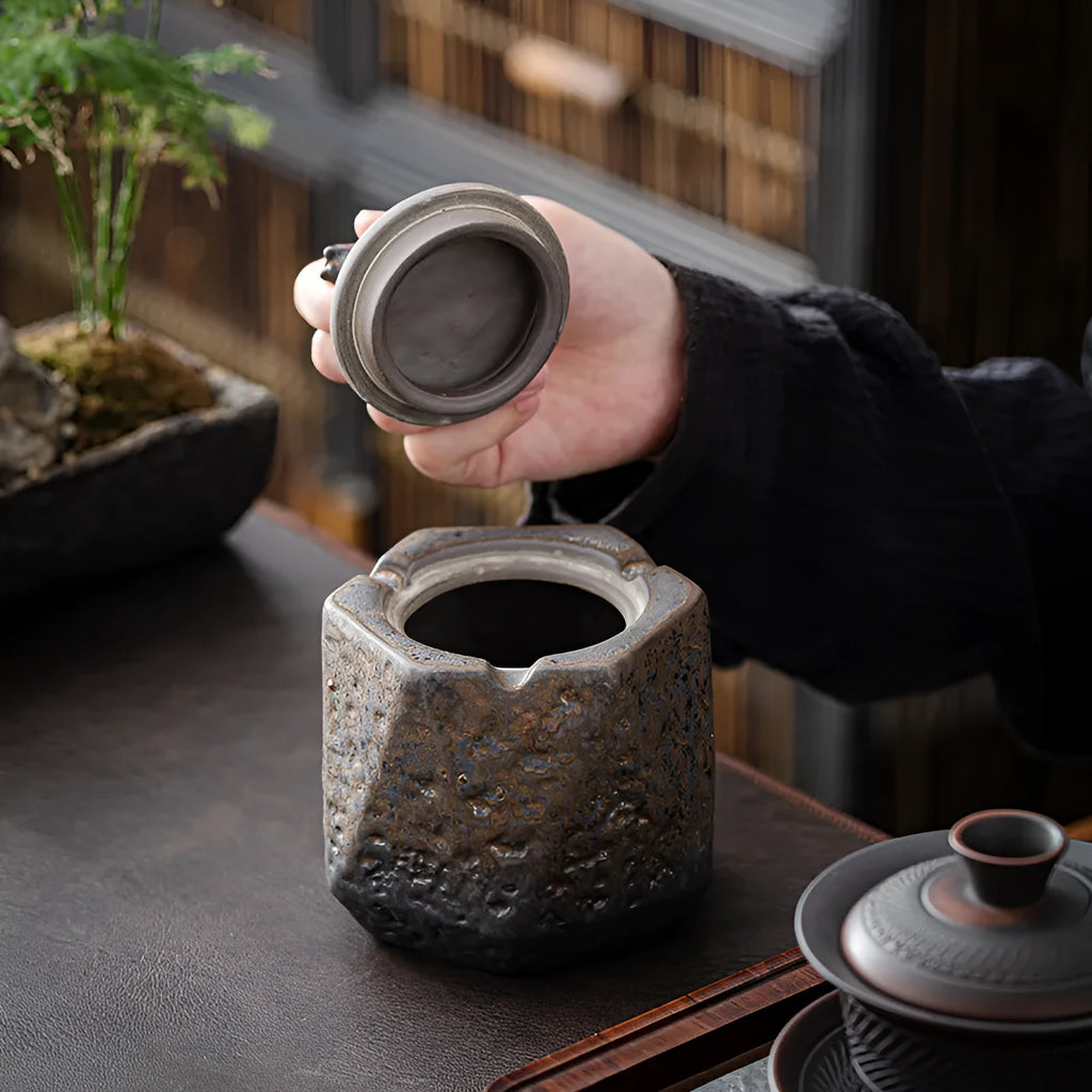 Stoneware ceramic ashtray with cover in Japanese retro style, gilt pony finish, placed in living room