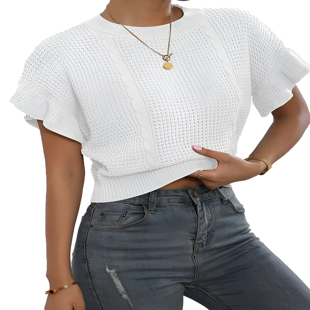 White twisted string knitted pullover sweater with ruffled short sleeves on a hanger.