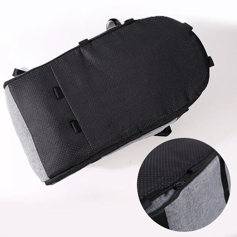 Foldable blue cloth dog kennel set up outdoors, showing mesh ventilation panels.