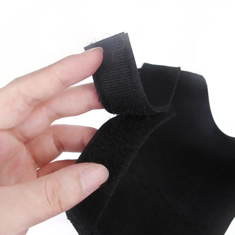 Pet wearing black felt bloody knife vest costume with plastic blade on Halloween