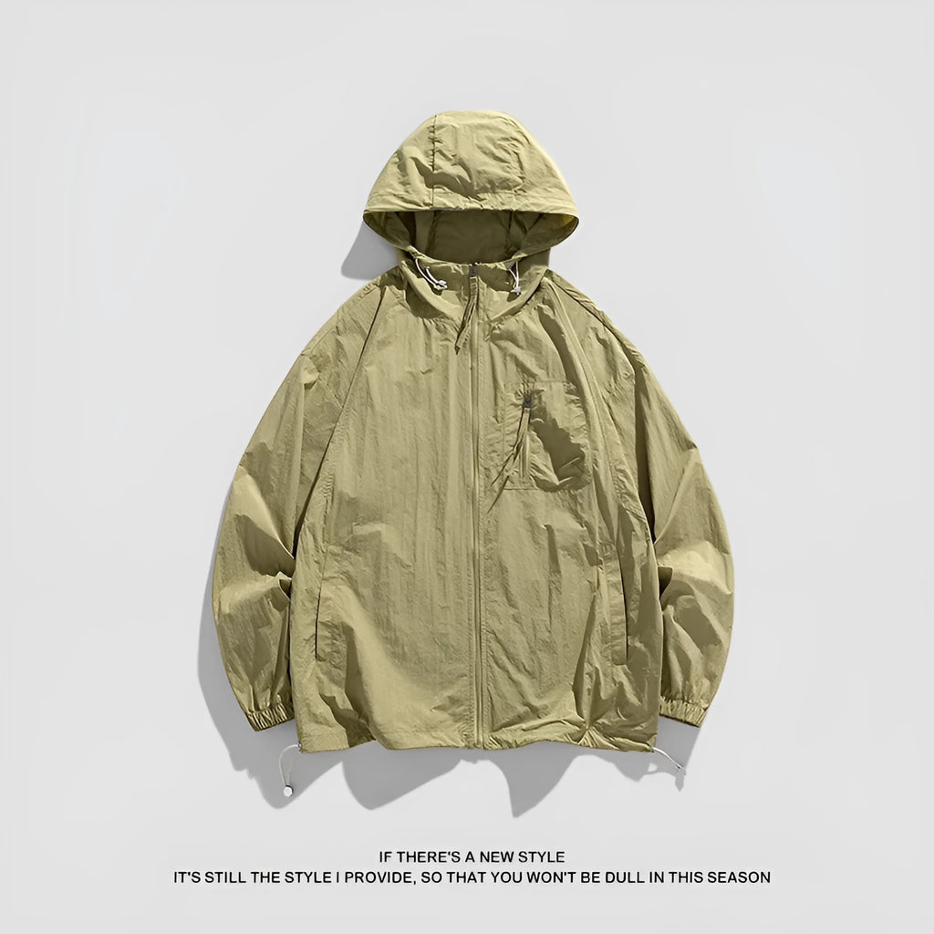 Lycra hooded sun protection jacket in light army green colour on a hanger