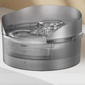 Automatic circulating water dispenser for dogs and cats with filter cartridge.