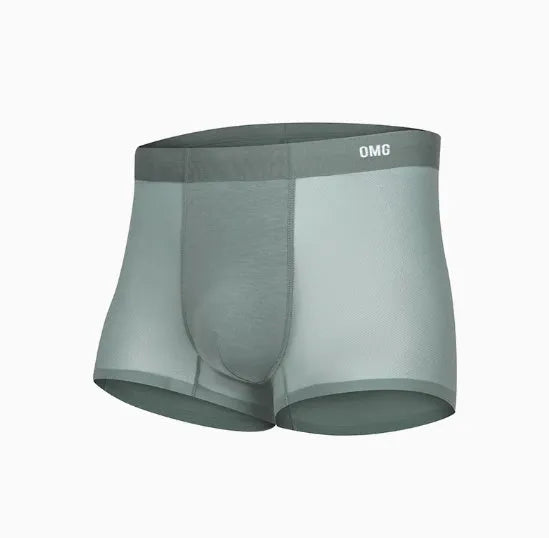 Man wearing seamless grey fitness shorts with antibacterial finish, sizes up to 3XL.
