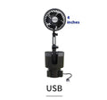 A car cup holder fan with black ABS plastic housing inserted into a vehicle's centre console.