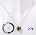 Natural stone beaded necklace and matching bracelet set laid flat, showing bead detail.
