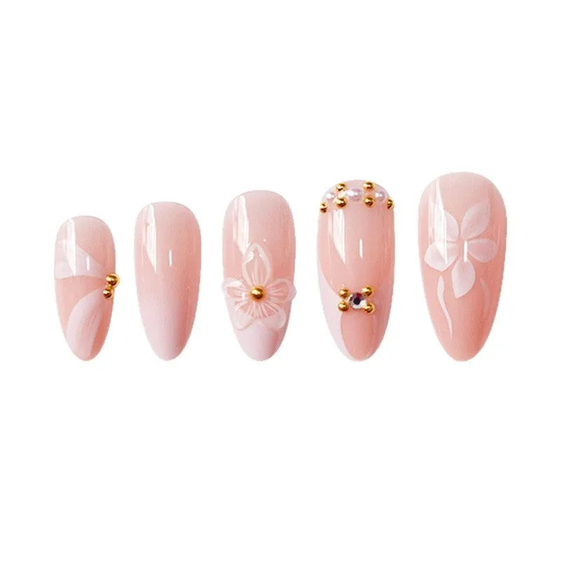 White almond fake nails with three-dimensional water ripple finish and flower pattern in colour AA214