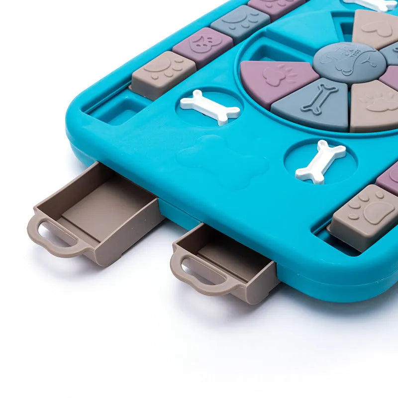 Blue interactive dog puzzle toy with four lockable handles, sliding panel and anti-skid base
