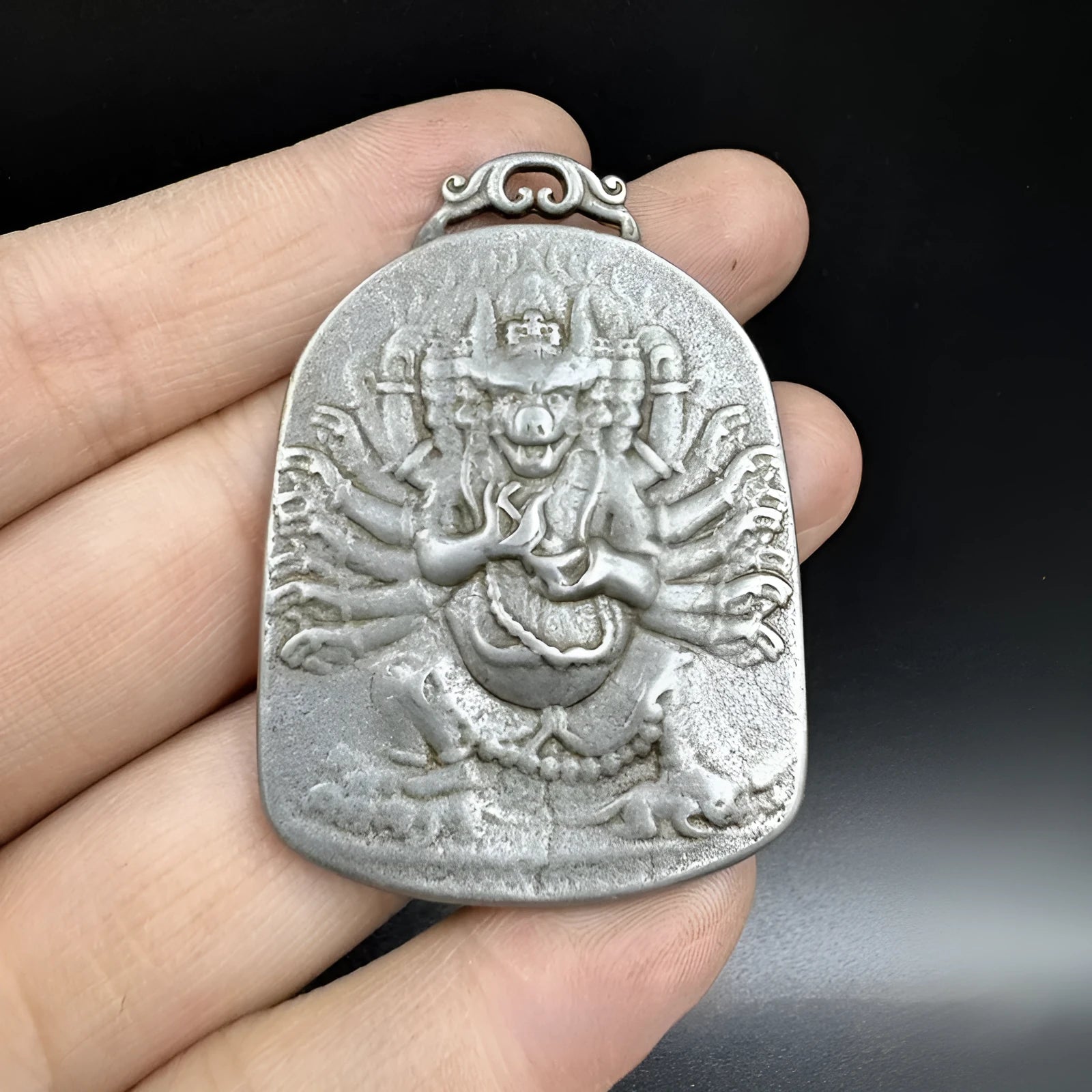 Antique iron pendant ornament with Chinese geometric design depicting the Yamantaka deity.