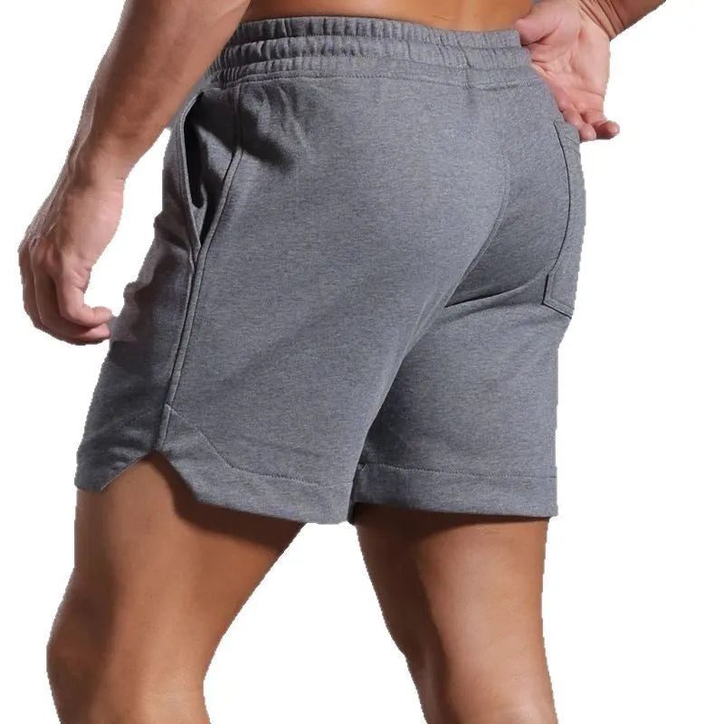 Men's below the knee cotton workout capris in black, mid waist loose fit