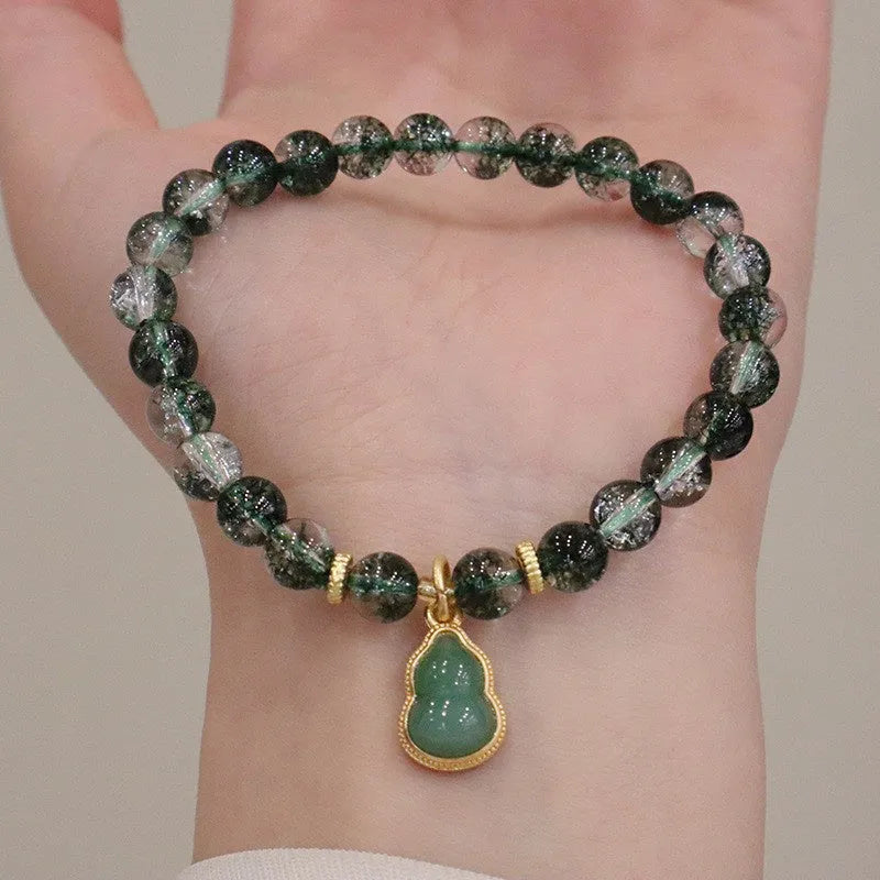 Handmade women's crystal bracelet with citrine, chorite, green phantom quartz hearts and pearls