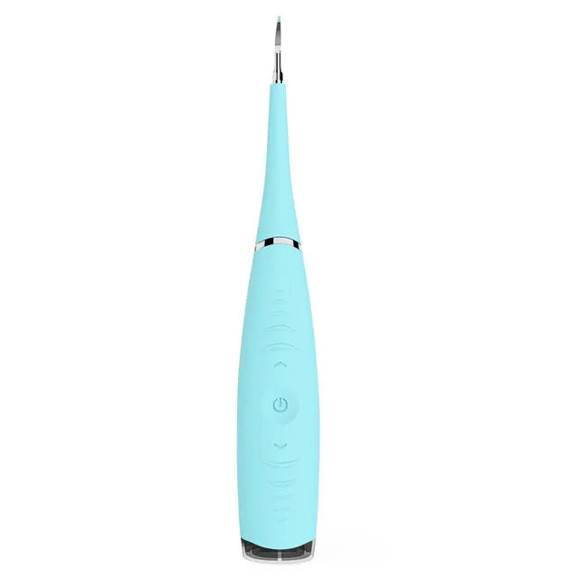 Pink and blue waterproof electric dental scaler tool on a bathroom counter with charging cable.