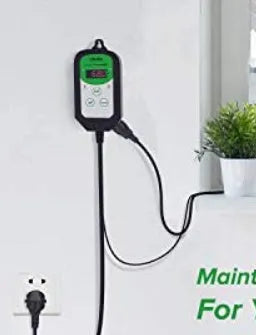 Digital temperature and humidity controller with LCD display showing temperature readings