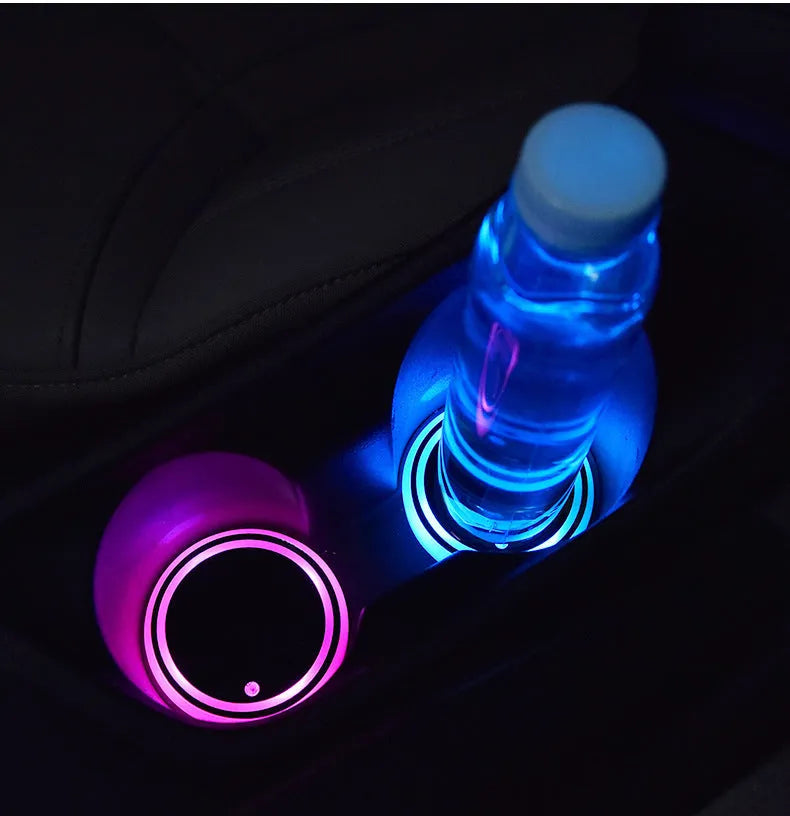 Colourful LED light-up car cup holder coaster showing seven colours, USB cable, and 68mm diameter non-slip surface.