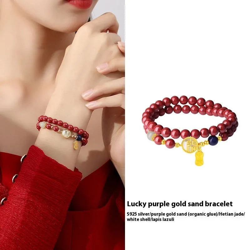 S925 sterling silver bracelet with Chinese blessing charms, cinnabar red and white shell accents on purple gold sandstone.