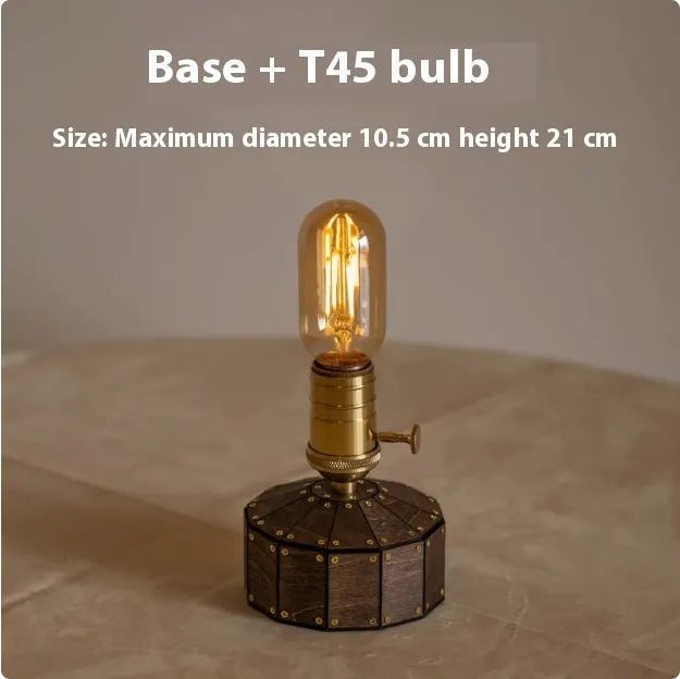 Retro table lamp with glass shade on wooden base, showing USB charging port and choice of LED bulb shapes.