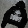 Black women's hoodie with dark cartoon print in loose polyester fabric