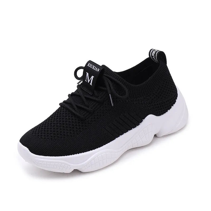 Women's white thick-soled sports shoe with woven upper and front strap