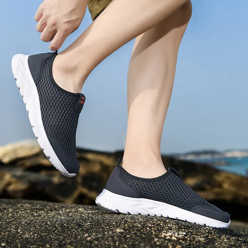 Pair of couple casual mesh shoes with PU mesh upper, hollow plaid detailing, and flat rubber sole in light gray, dark blue, black and white, or all black.