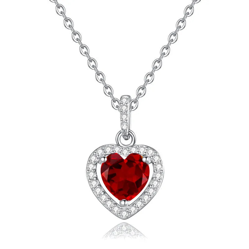 S925 sterling silver heart necklace with a natural gemstone on an adjustable cross chain for women.
